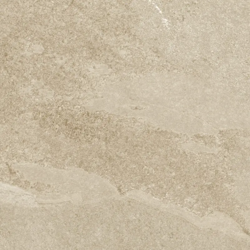 Superficie di una piastrella in gres porcellanato beige effetto pietra